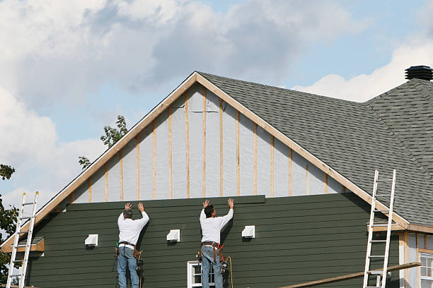 Professional Siding technician working in Maytown, PA
